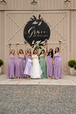 Bride and groom portraits by the water at Grace on the Lake