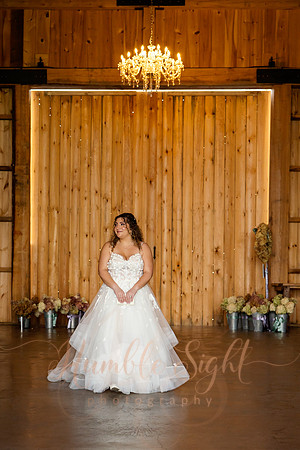 Bride and groom portraits by the water at Grace on the Lake