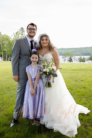 Bride and groom portraits by the water at Grace on the Lake