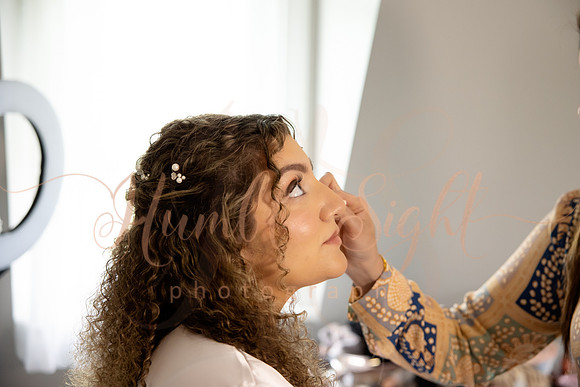 Bride and groom portraits by the water at Grace on the Lake