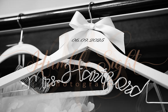 Bride and groom portraits by the water at Grace on the Lake