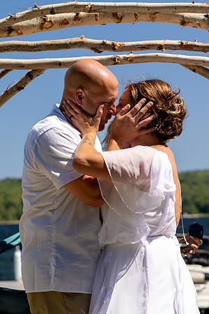 Wedding reception under tent at private waterfront home in Maine