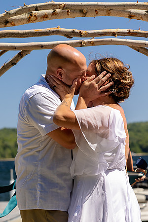 Wedding reception under tent at private waterfront home in Maine
