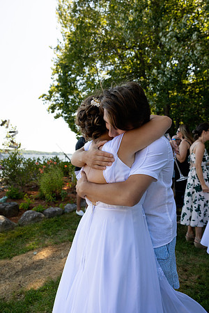 Intimate lakeside wedding ceremony at private home in Swanville Maine