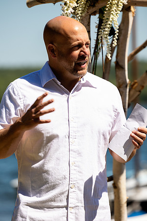 Intimate lakeside wedding ceremony at private home in Swanville Maine