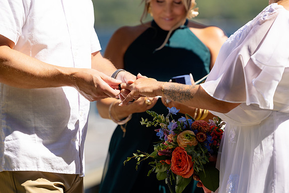 Wedding reception under tent at private waterfront home in Maine