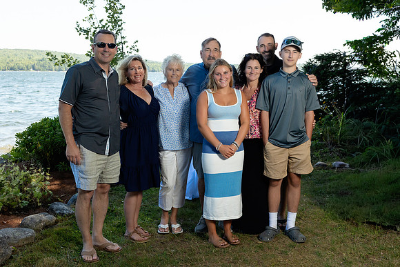 Wedding reception under tent at private waterfront home in Maine