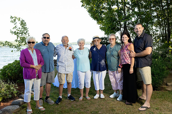 Wedding reception under tent at private waterfront home in Maine
