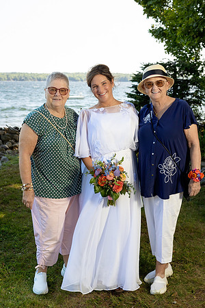 Intimate lakeside wedding ceremony at private home in Swanville Maine