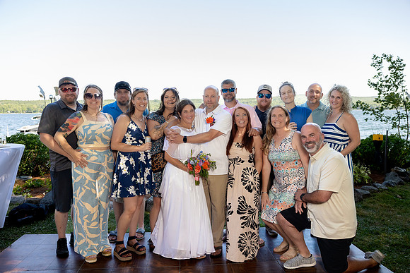 Intimate lakeside wedding ceremony at private home in Swanville Maine