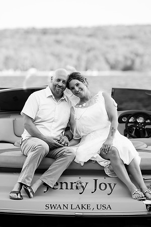 Bride and groom portrait on dock at Swan Lake Maine in August