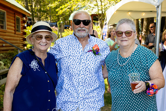 Wedding reception under tent at private waterfront home in Maine