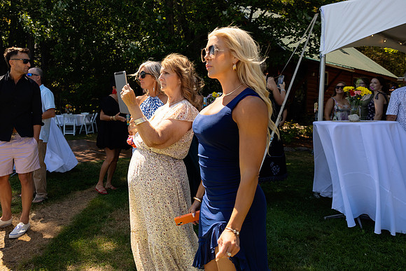 Intimate lakeside wedding ceremony at private home in Swanville Maine