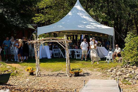 Tented waterfront wedding reception on Swan Lake Maine