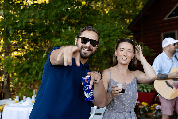 Wedding reception under tent at private waterfront home in Maine