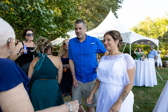Intimate lakeside wedding ceremony at private home in Swanville Maine