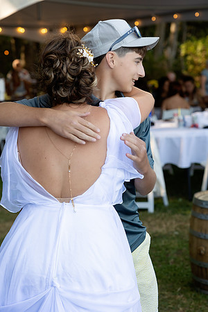 Wedding reception under tent at private waterfront home in Maine