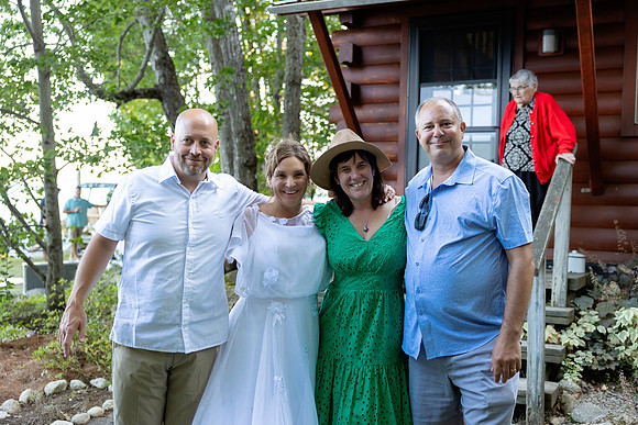 Intimate lakeside wedding ceremony at private home in Swanville Maine