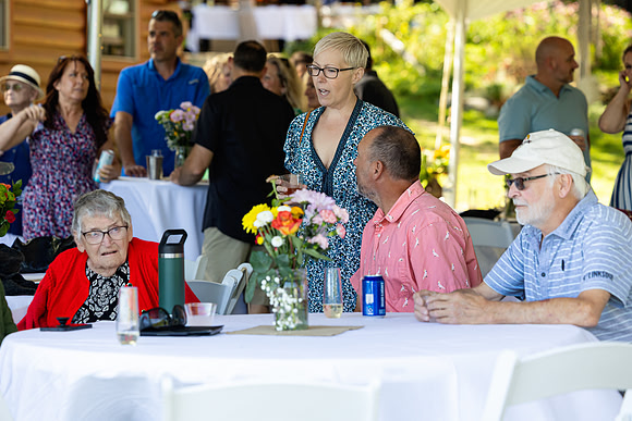 Newlyweds celebrating at lakeside wedding in Swanville Maine