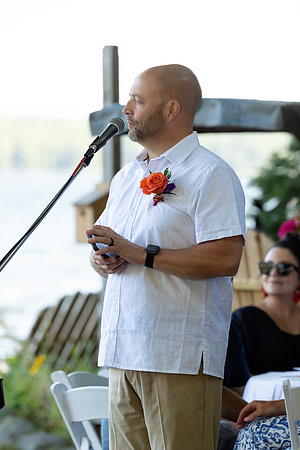 Wedding reception under tent at private waterfront home in Maine