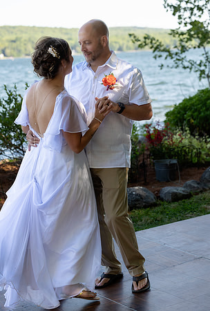 Intimate lakeside wedding ceremony at private home in Swanville Maine