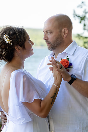 Intimate lakeside wedding ceremony at private home in Swanville Maine