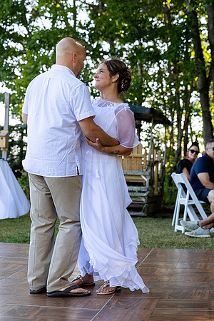 Wedding reception under tent at private waterfront home in Maine