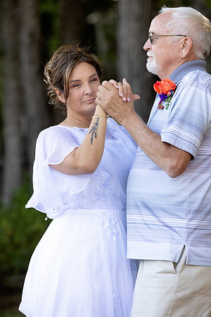 Wedding reception under tent at private waterfront home in Maine