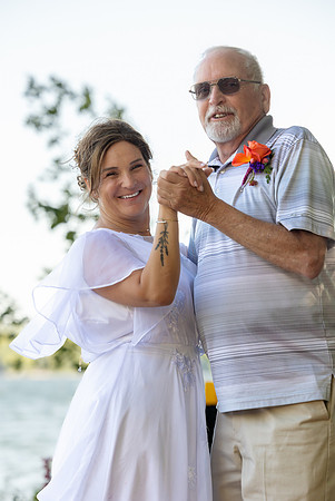 Wedding reception under tent at private waterfront home in Maine