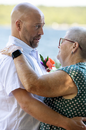 Small intimate Maine lake wedding with family and friends