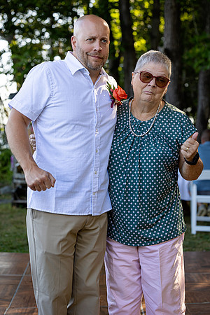 Wedding reception under tent at private waterfront home in Maine