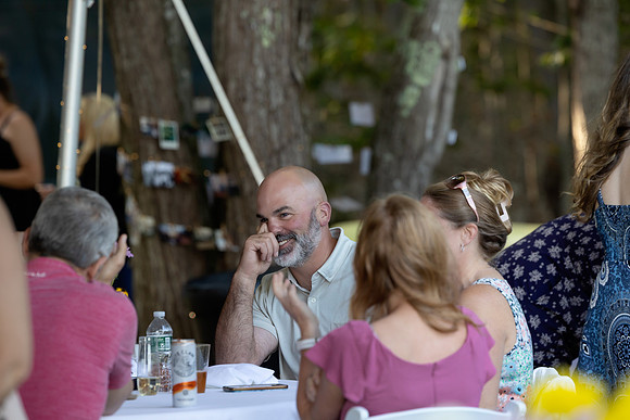 Tented waterfront wedding reception on Swan Lake Maine