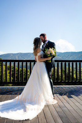 Bangor Maine wedding photography of couple portrait on balcony of SkiEsta near Sunday River