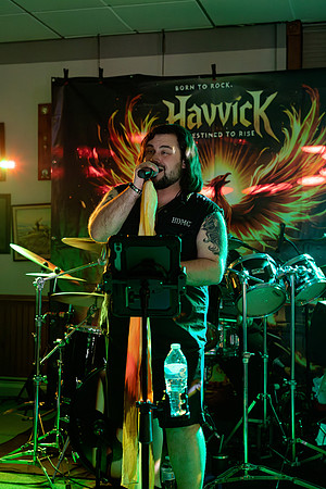 Maine musicians performing rock concert in Bangor