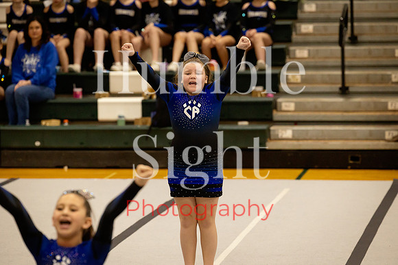 Cheer athletes celebrating at Spirit Showdown event