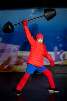 Actors in SpongeBob costumes performing on stage
