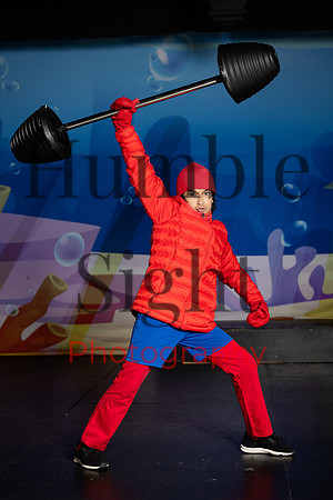 Actors in SpongeBob costumes performing on stage