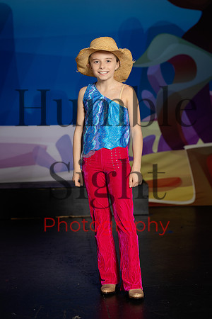 Youth theatre cast performing SpongeBob on stage