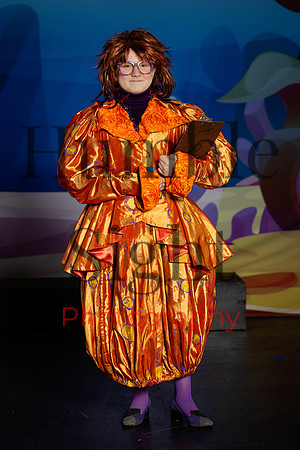 Actors in SpongeBob costumes performing on stage