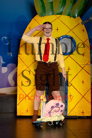 Youth theatre cast performing SpongeBob on stage