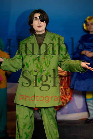 Actors in SpongeBob costumes performing on stage