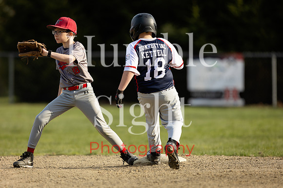 Youth baseball player batting in Holden Maine