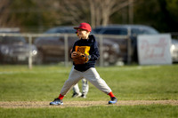 Baseball players competing at Holbrook Little League