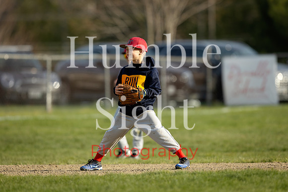 Baseball players competing at Holbrook Little League