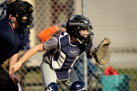 Little League pitcher throwing during game in Holden Maine