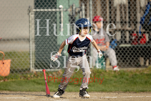 Youth baseball player batting in Holden Maine