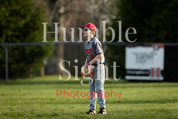 Little League baseball action in central Maine