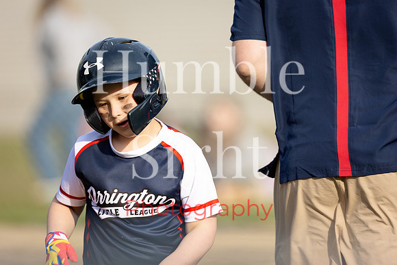 Baseball players competing at Holbrook Little League