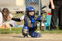 Little League pitcher throwing during game in Holden Maine
