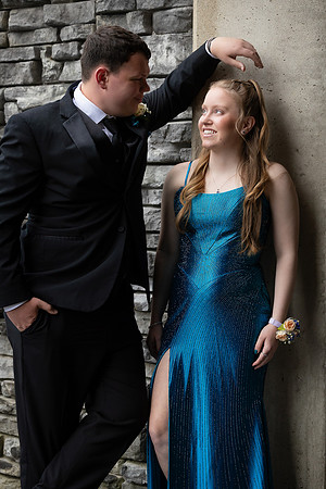 High school prom couple posing at Brewer Riverwalk
